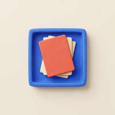 Clay inbox tray stacked with small documents